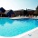 pool with lounge chairs