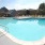 pool with lounge chairs